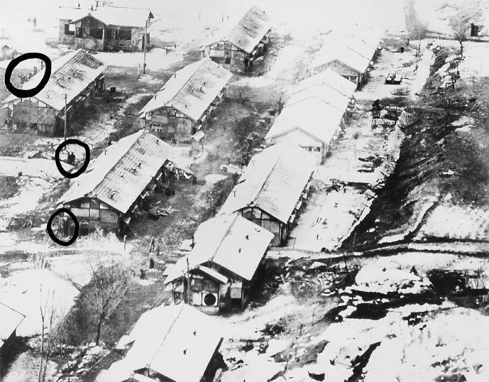 Framed Print : Aerial photo taken by a low flying U.S. Air Force jet of Chiktong POW camp in North Korea. In the circles are men, some waving. Ca. 1950-51. Korean War, 1950-53