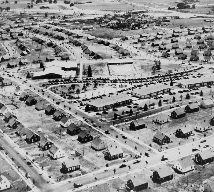 Framed Print : Aerial view of Levittown New York in 1953. Levittown was named after William Levitt the builder of the planned suburban community on Long Island New York. Ca. 1950