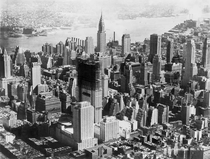 Framed Print : Aerial view of mid-town Manhattan during construction of Rockefeller Center. In center background is the Chrysler building. 1932 Framed Print : Aerial view of mid-town Manhattan during construction of Rockefeller Center. In center background is the Chrysler building. 1932