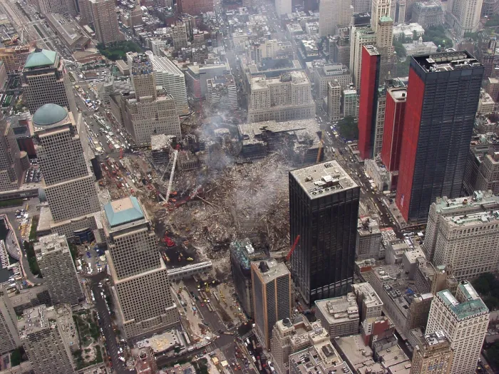 Framed Print : Aerial view of World Trade Center from the southwest, Sept. 27, 2001. Orange reinforcing plastic covers the street facades of severely damaged buildings on Church Street Framed Print : Aerial view of World Trade Center from the southwest, Sept. 27, 2001. Orange reinforcing plastic covers the street facades of severely damaged buildings on Church Street