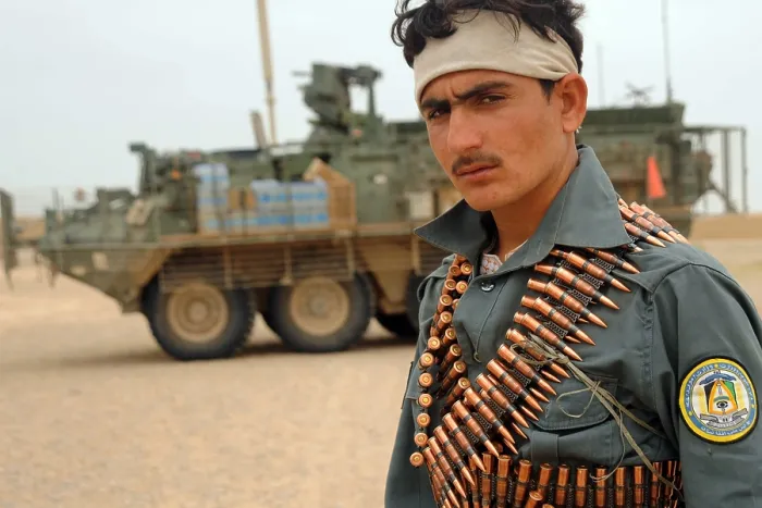 Framed Print : An Afghan National Policeman takes part in a joint patrol with U.S. Infantry in Gavband village Helmand province Afghanistan Feb