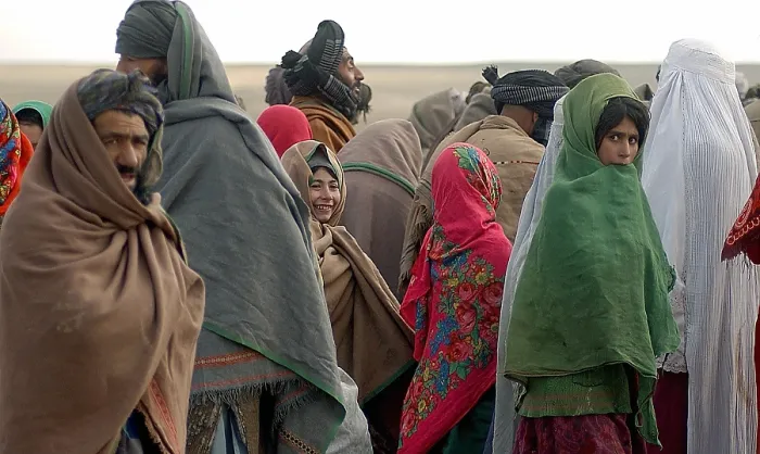 Framed Print : Afghani refugees in Sakhi Camp in Mazar-e Sharif Kandahar Afghanistan to collect humanitarian aid from Doctors Without Borders organization. Dec Framed Print : Afghani refugees in Sakhi Camp in Mazar-e Sharif Kandahar Afghanistan to collect humanitarian aid from Doctors Without Borders organization. Dec