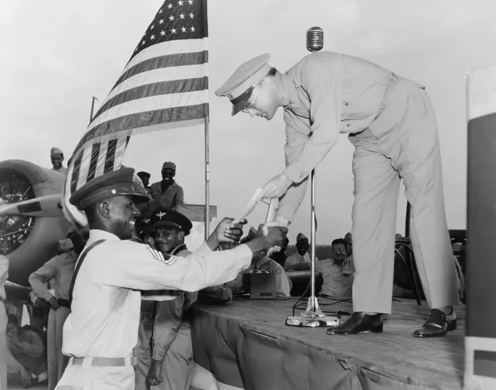 Framed Print : African American Airman receiving a military award at Tuskegee Army Air Field, Alabama. 992 World War 2 pilots were trained in Tuskegee. (BSLOC_2013_11_188) Framed Print : African American Airman receiving a military award at Tuskegee Army Air Field, Alabama. 992 World War 2 pilots were trained in Tuskegee. (BSLOC_2013_11_188)