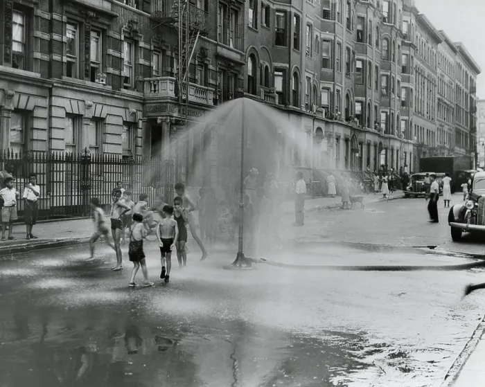 Framed Print : African American children playing in water sprayed from a sprinkler in South Harlem, NYC, Aug. 8, 1937. (BSLOC_2013_8_96)