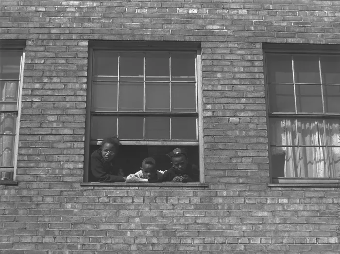 Framed Print : African American children at window of a city apartment building ca. 1950 Framed Print : African American children at window of a city apartment building ca. 1950