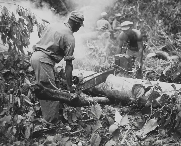Framed Print : African American combat engineers use a motor-driven saw to remove trees on a trail on Bougainville. July 17, 1944. World War 2. (BSLOC_2014_10_229) Framed Print : African American combat engineers use a motor-driven saw to remove trees on a trail on Bougainville. July 17, 1944. World War 2. (BSLOC_2014_10_229)