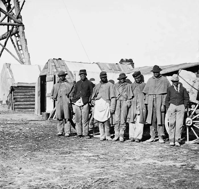 Framed Print : African-American contrabands dressed in old Union uniforms worked as teamsters, managing the mule and horse pulled wagons for the Union Army of the James. 1864-65 Framed Print : African-American contrabands dressed in old Union uniforms worked as teamsters, managing the mule and horse pulled wagons for the Union Army of the James. 1864-65