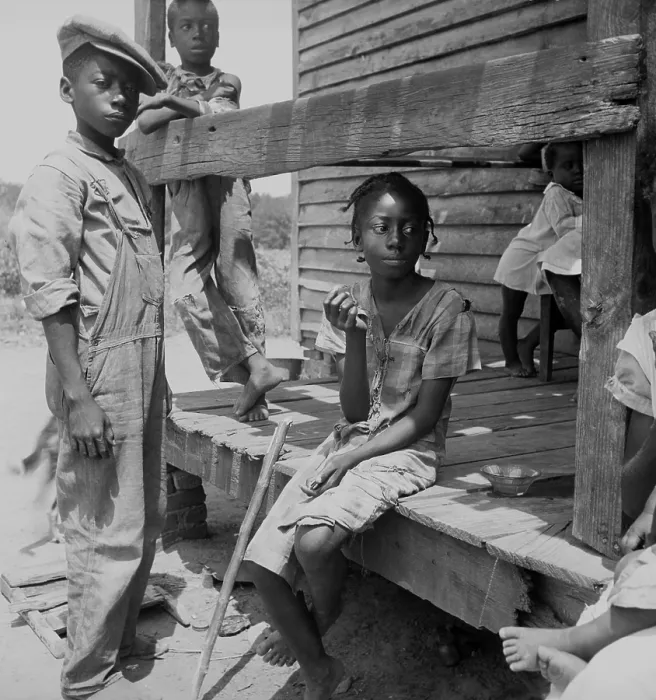 Framed Print : African American farm children on the porch of their home in the Mississippi Delta. Photo by Dorothea Lange, June 1936