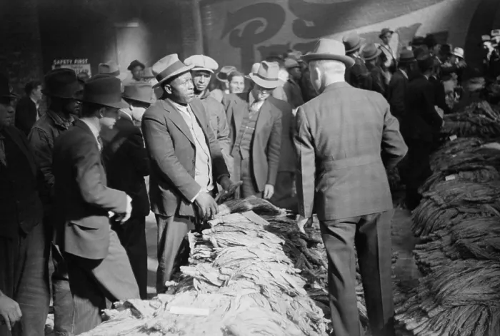Framed Print : African American farmer negotiating at a tobacco Auction, Durham, North Carolina, Nov. 1939. Photo by Marion Wolcott. (BSLOC_2013_8_119)