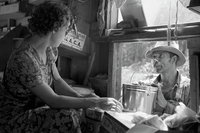 Framed Print : African American man making purchases at a traveling store, original title: Negro making purchase at traveling grocery store, Forrest City, Arkansas