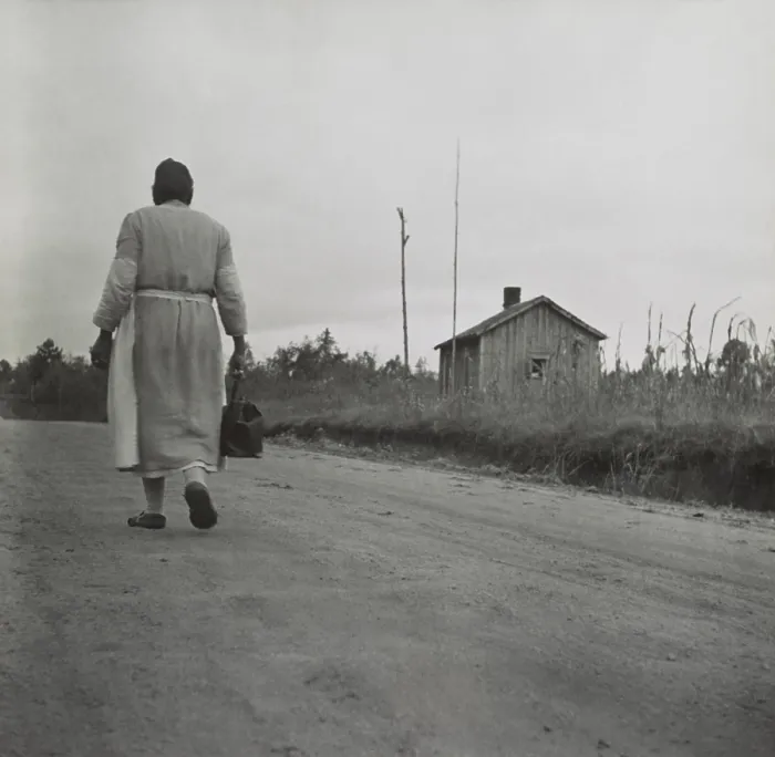 Framed Print : African American Midwife carrying her medical bag on a dirt road in Georgia. Nov. 1941 photo by Jack Delano. - (BSLOC_2015_1_189)