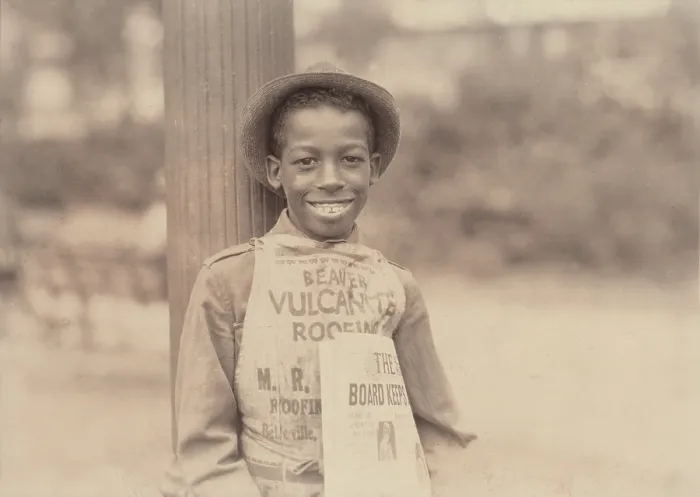 Framed Print : African American newsie, original caption: Roland, eleven year old negro newsboy, Newark, New Jersey, photograph by Lewis Wickes Hine, August 1, 1924