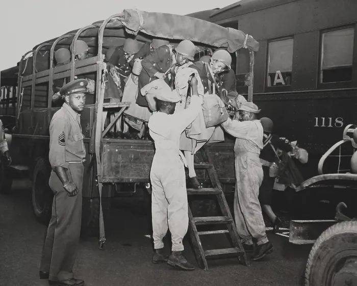 Framed Print : African American nurses are helped out of an Army truck. They are enroute to Europe during World War 2. Aug. 21, 1944. (BSLOC_2014_10_226) Framed Print : African American nurses are helped out of an Army truck. They are enroute to Europe during World War 2. Aug. 21, 1944. (BSLOC_2014_10_226)