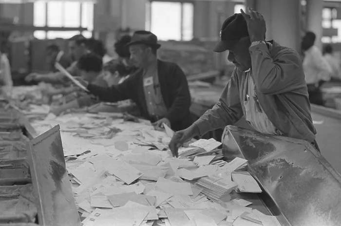 Framed Print : African American postal employees sorting mail beside white workers. March 1, 1966, Washington, D.C. vicinity. (BSLOC_2015_14_106) Framed Print : African American postal employees sorting mail beside white workers. March 1, 1966, Washington, D.C. vicinity. (BSLOC_2015_14_106)