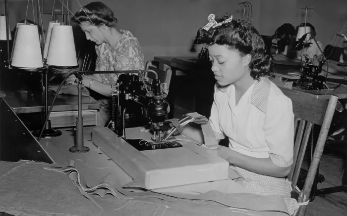 Framed Print : African American sewing a shirt in an integrated workroom, Waterloo, Iowa, Aug. 1941. (BSLOC_2013_8_120) Framed Print : African American sewing a shirt in an integrated workroom, Waterloo, Iowa, Aug. 1941. (BSLOC_2013_8_120)