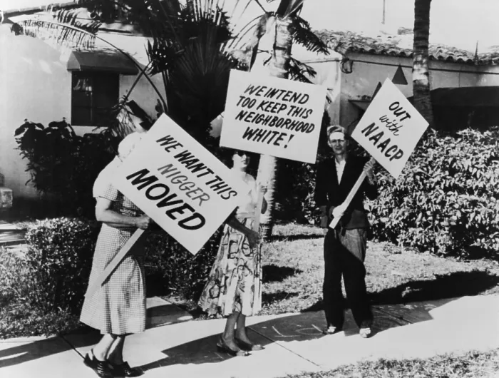 Framed Print : African American singer Frank Legree's home was picketed. Three White people carrying signs with racist slogans in front his house in Miami, Florida. 1957 Framed Print : African American singer Frank Legree's home was picketed. Three White people carrying signs with racist slogans in front his house in Miami, Florida. 1957