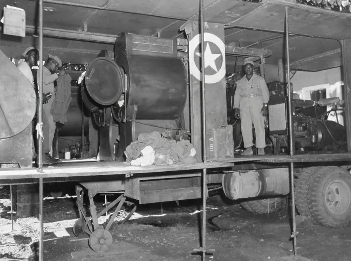 Framed Print : African American soldiers assigned to a mobile washing unit, of the 549th Quartermaster Laundry. They are with the Seventh Army, Poligny Area, France. Sept 22, 1944. World War 2
