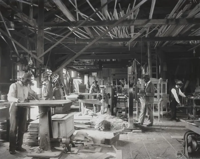 Framed Print : African American students working in a mechanized wood workshop at Tuskegee Institute, c. 1902 Framed Print : African American students working in a mechanized wood workshop at Tuskegee Institute, c. 1902