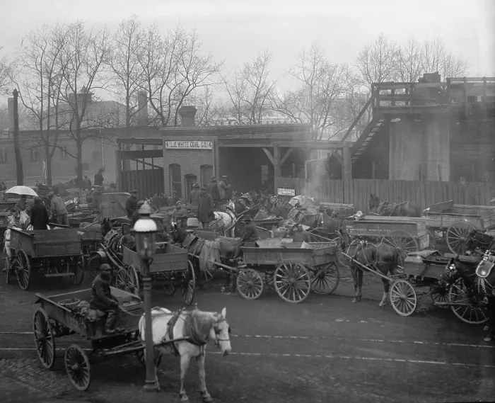 Framed Print : African American teamsters line up with their wagons at the Washington, D.C. coal yard in 1922 to load coal for home heating