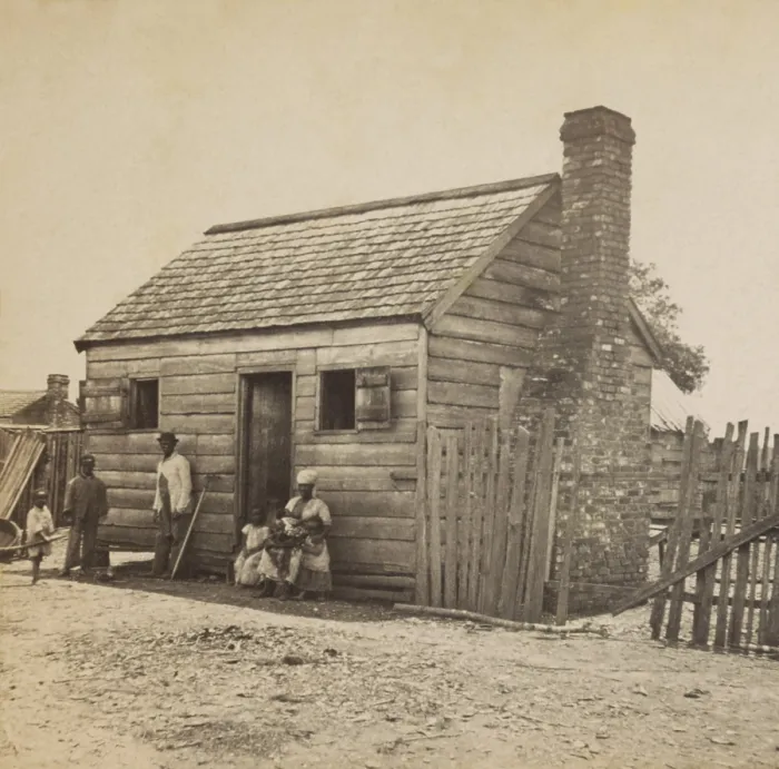 Framed Print : African American Uncle July and his family in front of their home on the Fripp plantation, St. Helena Island, SC, 1863-66 Framed Print : African American Uncle July and his family in front of their home on the Fripp plantation, St. Helena Island, SC, 1863-66