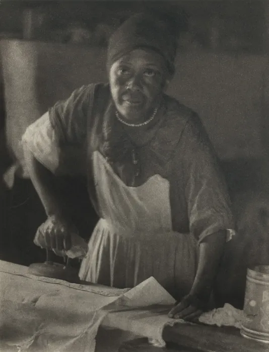 Framed Print : African American woman ironing, ca. 1930. Photogravure of image by Doris Ulmann. She is best known for her sensitive portraits of rural Southern people between 1928-1934 Framed Print : African American woman ironing, ca. 1930. Photogravure of image by Doris Ulmann. She is best known for her sensitive portraits of rural Southern people between 1928-1934