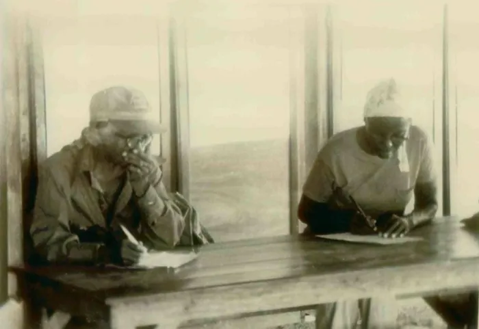 Framed Print : Two African American women in an adult education in class. People's Temple Agricultural Project. Jonestown, Guyana. Nov. 1978