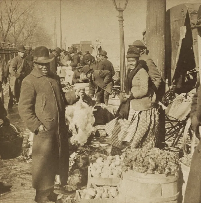 Framed Print : African American women at outdoor farmers market selling vegetables in Washington, D.C. An African American man in foreground holds a fine dead chicken, c. 1889 (BSLOC_2017_20_97) Framed Print : African American women at outdoor farmers market selling vegetables in Washington, D.C. An African American man in foreground holds a fine dead chicken, c. 1889 (BSLOC_2017_20_97)