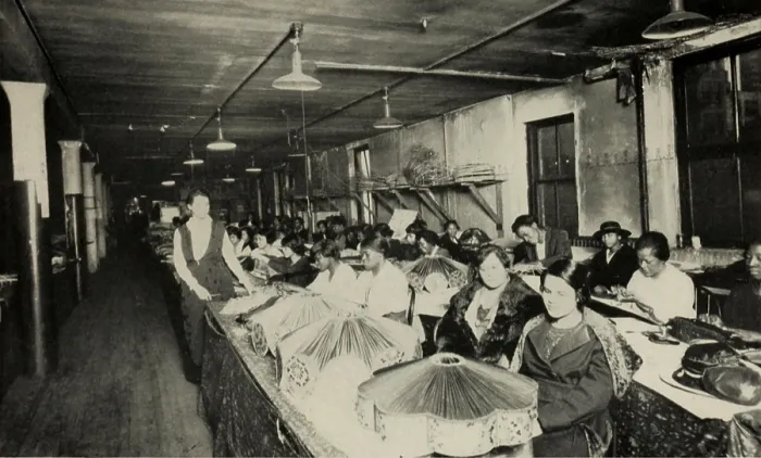 Framed Print : African American women working in a lampshade factory in Chicago, ca. 1920. Approximately 40 women worked in a sweatshop supervised by a white woman. (BSLOC_2015_16_136) Framed Print : African American women working in a lampshade factory in Chicago, ca. 1920. Approximately 40 women worked in a sweatshop supervised by a white woman. (BSLOC_2015_16_136)