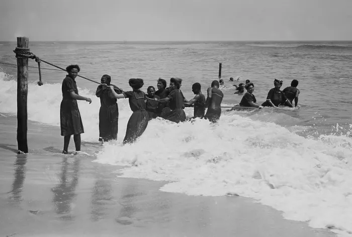 Framed Print : African Americans enjoying the beach at Asbury Park, New Jersey, in July 1908. The women are dressed in bathing dresses and stockings as they play in the surf (BSLOC_2017_20_122) Framed Print : African Americans enjoying the beach at Asbury Park, New Jersey, in July 1908. The women are dressed in bathing dresses and stockings as they play in the surf (BSLOC_2017_20_122)