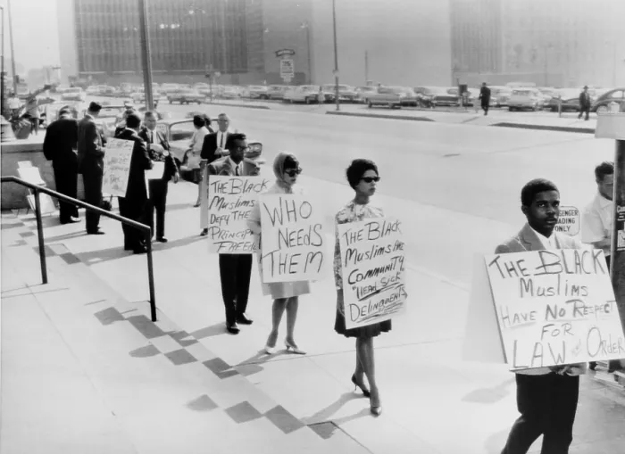 Framed Print : African Americans protesting Black Muslims in front of the Los Angeles County courthouse. April 29, 1963