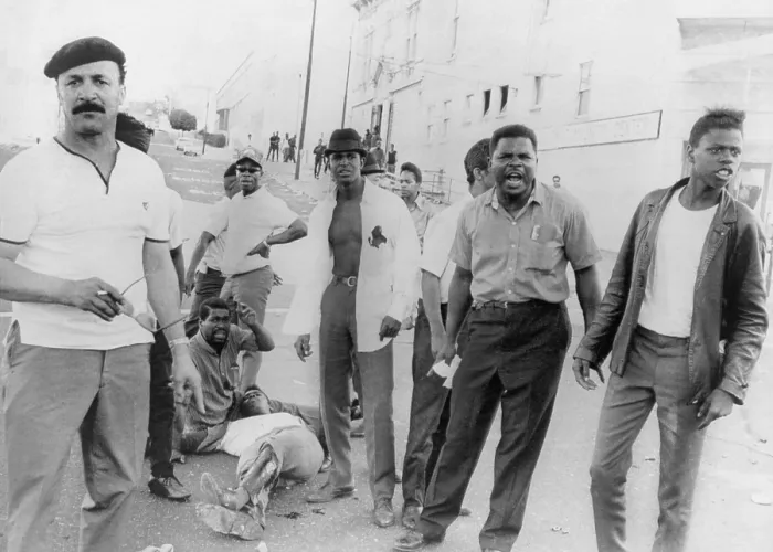 Framed Print : African Americans shout obscenities at police who fired upon them, wounding two, during rioting in San Francisco's Hunters Point area. December 12, 1966