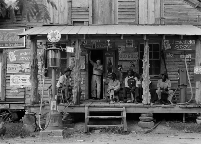 Framed Print : African Americans socializing on a Sunday afternoon at a country store, Gordonton, North Carolina, July 1939. The white store keeper joins the conversations