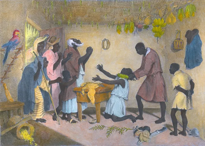 Framed Print : Afro-Caribbeans engaging in a divination ritual to identify a thief. A man wraps leaves around neck of a kneeling man while another man waits, as others watch Framed Print : Afro-Caribbeans engaging in a divination ritual to identify a thief. A man wraps leaves around neck of a kneeling man while another man waits, as others watch