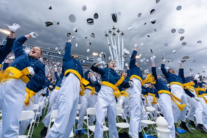 Framed Print : US Air Force Academy Cadets toss their hats in the air as the Thunderbirds formation flies over the Air Force Academy, June 1, 2023, in Colorado Springs
