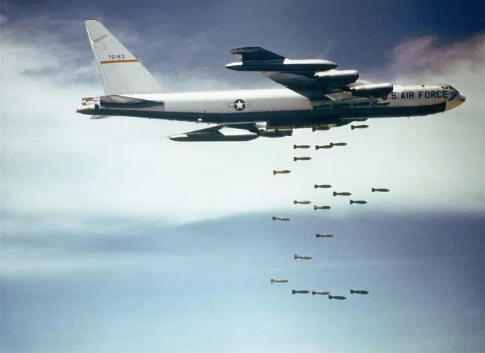 Framed Print : US Air Force B-52 dropping 750 pound bombs over Vietnam. Ca. 1965-1966. (BSLOC_2011_12_218)