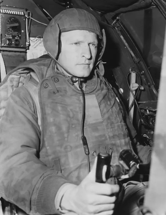 Framed Print : Air Force pilot at the controls of his B-29 just prior to take-off on a mission in North Korea. He wears 105 pounds of flight gear necessary for combat missions