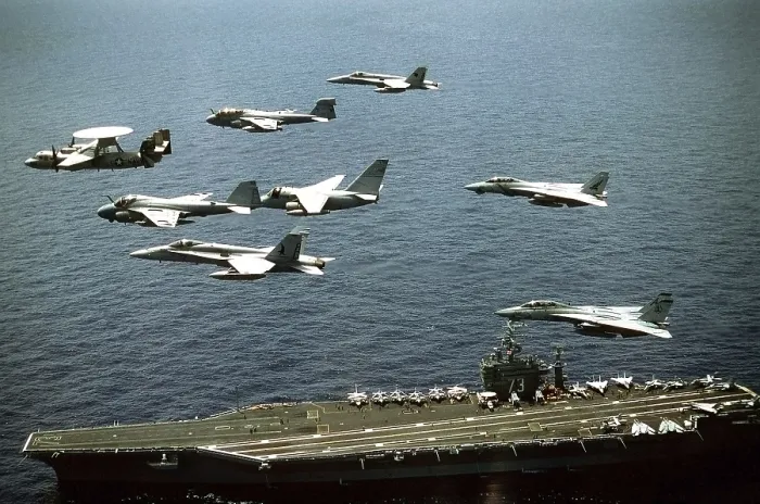 Framed Print : Aircraft assigned to the nuclear-powered aircraft carrier USS GEORGE WASHINGTON fly over the ship