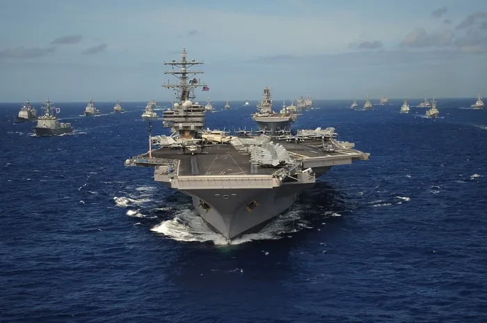 Framed Print : Aircraft carrier USS Ronald Reagan leads a formation of allied ships from through the Pacific Ocean. July 24 2010. (BSLOC_2011_12_253)