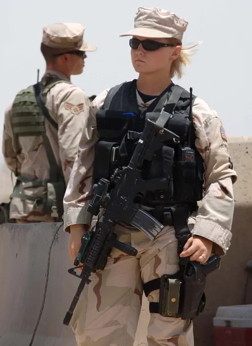 Framed Print : Two US Airman stand watch at Sather Air Base in Iraq. One is female in combat gear. Ca. 2008. (BSLOC_2011_12_368)