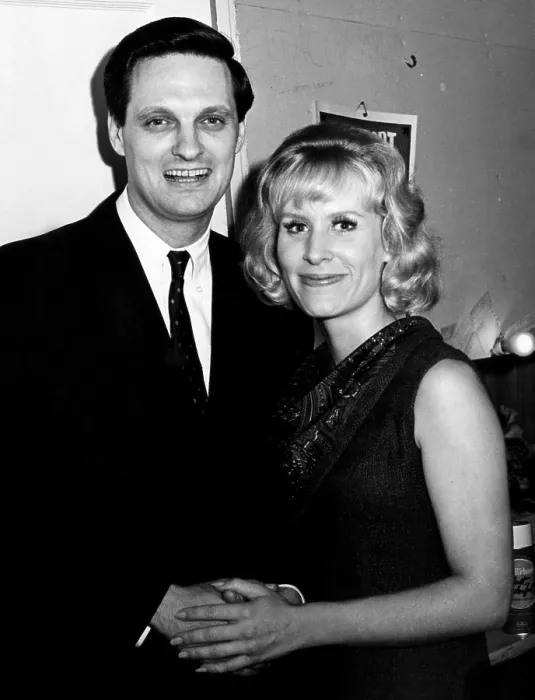 Framed Print : Alan Alda and Christina Crawford at the premiere of the play The Midnight Ride of Alvin Blum at the Westport Country Playhouse in Westport, Connecticut
