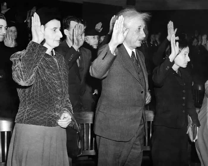 Framed Print : Albert Einstein taking his oath of citizenship. Also taking swearing allegiance in are Helen Dukas, and Einstein's daughter, Margot. Oct. 1, 1940 Framed Print : Albert Einstein taking his oath of citizenship. Also taking swearing allegiance in are Helen Dukas, and Einstein's daughter, Margot. Oct. 1, 1940