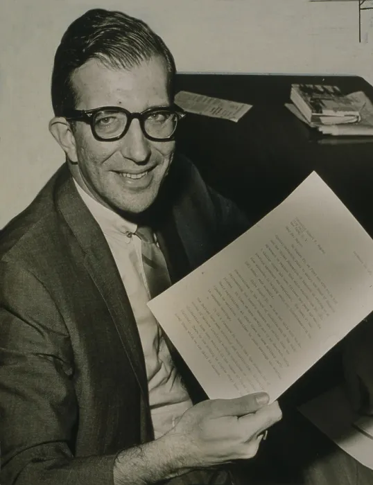 Framed Print : Albert Shanker (1928-1997), leader of the New York City teachers union, threatened to strike during contract negotiations, holding a report issued by mediators in 1965