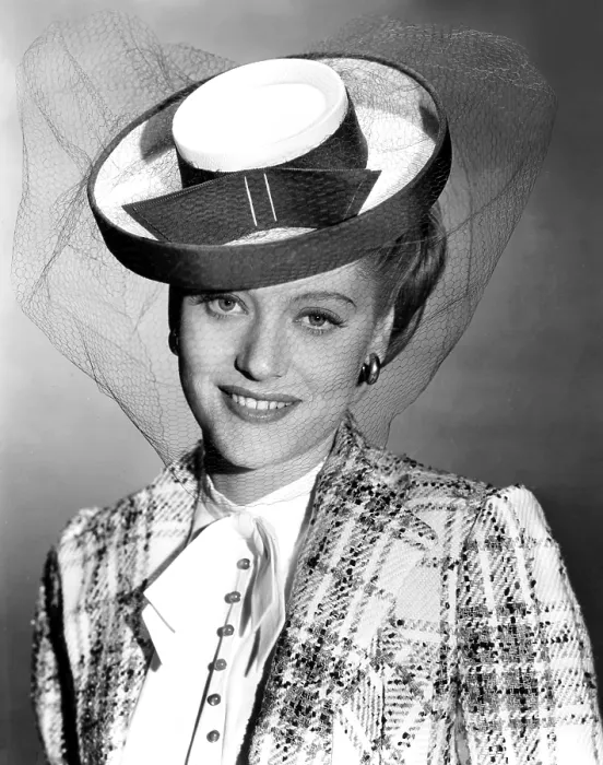 Framed Print : Alexis Smith, modeling a green and white tweed suit, with grosgrain-trimmed hat, summer 1943