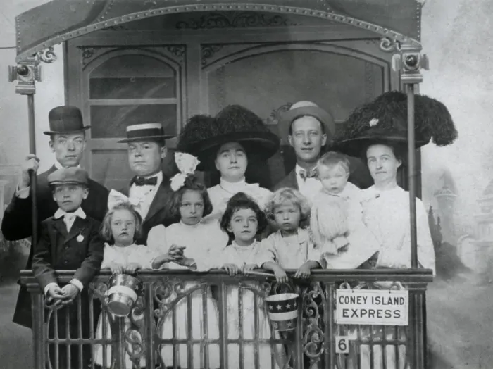 Framed Print : Alfred E. Smith and friends in a staged Studio Portrait, on The Coney Island Express. Ca. 1910