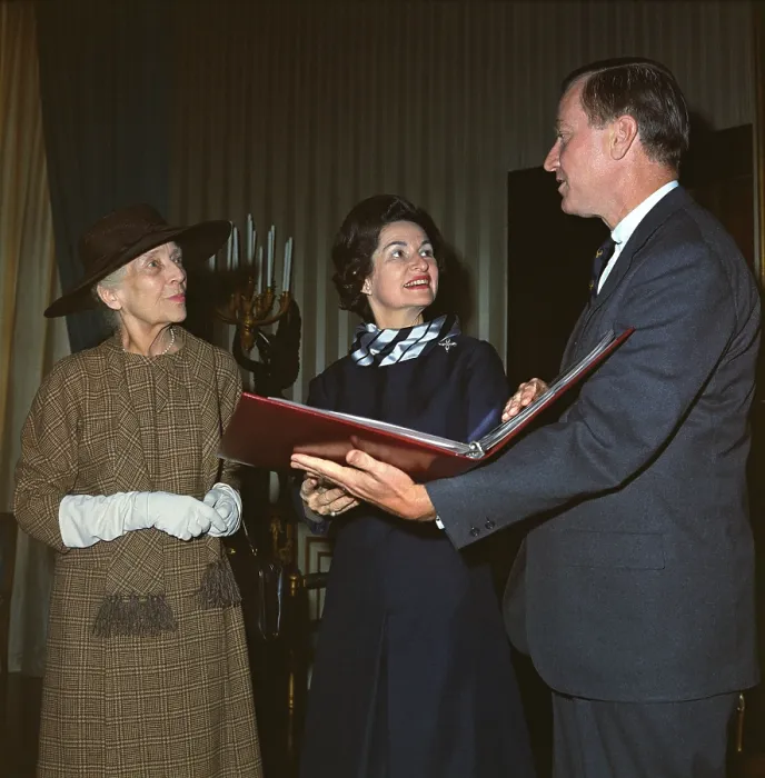 Framed Print : Alice Roosevelt Longworth returns to the White House. Lady Bird Johnson and Teddy Roosevelt's oldest child, Alice are shown an album at the White House, March 21, 1966