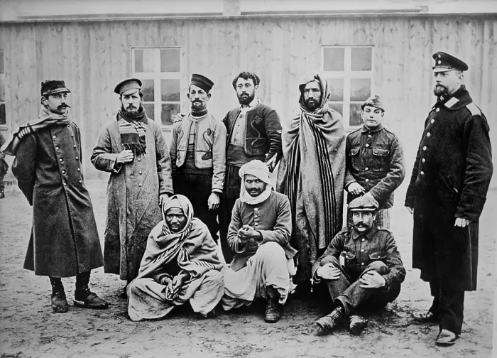 Framed Print : Allied POWs in a variety of uniforms at a prison camp in Zossen, Germany. 1914-15. Five solders in the center are from the Army of Africa Framed Print : Allied POWs in a variety of uniforms at a prison camp in Zossen, Germany. 1914-15. Five solders in the center are from the Army of Africa