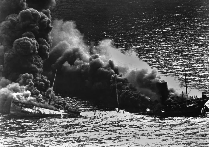 Framed Print : Allied tanker torpedoed in Atlantic Ocean by German submarine during World War 2. The ship crumbled amidships under heat of fire as she settled toward bottom of sea. 1942 Framed Print : Allied tanker torpedoed in Atlantic Ocean by German submarine during World War 2. The ship crumbled amidships under heat of fire as she settled toward bottom of sea. 1942