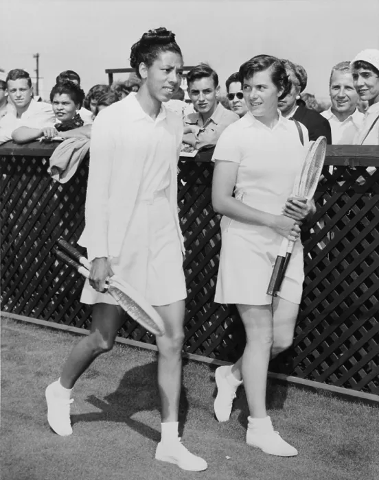 Framed Print : Althea Gibson and Barbara Knapp walk on grass at Forest Hills in 1950. Gibson won 10 straight championships in 1947 in the segregated ATA (American Tennis Association)