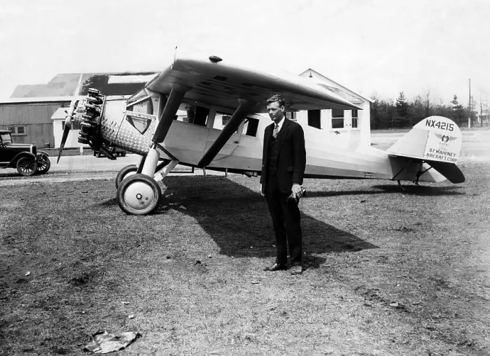 Framed Print : America pilot Charles Lindbergh, with his new monoplane in the background at Curtis Field, Long Island, New York, 1928.. Courtesy: CSU Archives  /  Everett Collection