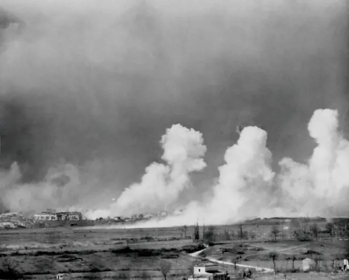 Framed Print : American bombs explode in the town of Cassino, Feb. 15, 1944. The town was completely destroyed but German defenders survived in cellars